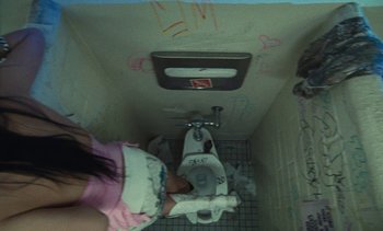 Movie still from “The Kid LAROI - …Growing Up” (2023), directed by Ramez Silyan – Medium shot, Overhead angle