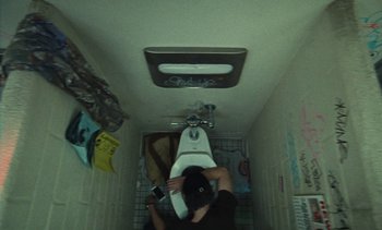 Movie still from “The Kid LAROI - …Growing Up” (2023), directed by Ramez Silyan – Medium shot, Overhead angle