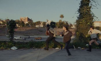 Movie still from “The Kid LAROI - …Growing Up” (2023), directed by Ramez Silyan – Extreme Wide shot, High angle