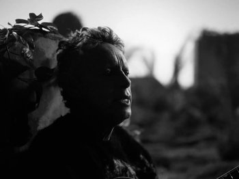 Movie still from “Depeche Mode - Ghosts Again” (2023), directed by Anton Corbijn – Close Up shot, Low angle