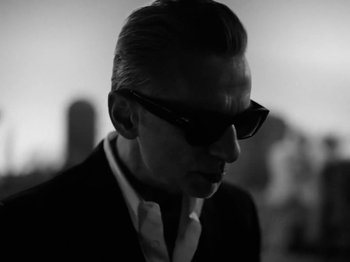 Movie still from “Depeche Mode - Ghosts Again” (2023), directed by Anton Corbijn – Close Up shot, Low angle