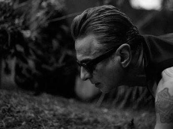 Movie still from “Depeche Mode - Ghosts Again” (2023), directed by Anton Corbijn – Close Up shot, Low angle