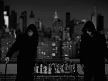 Movie still from “Depeche Mode - Ghosts Again” (2023), directed by Anton Corbijn – Medium shot, Low angle