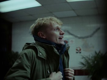 Movie still from “Lewis Capaldi - Pointless” (2023), directed by Hector Dockrill – Close Up shot, Low angle