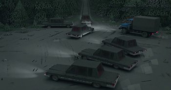 Movie still from “Monetochka - Burn” (2023), directed by Lado Kvataniya – Extreme Wide shot, High angle