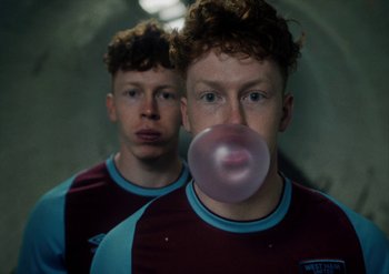 Movie still from “Bakar - Noun” (2022), directed by Machine Operated – Close Up shot, Low angle