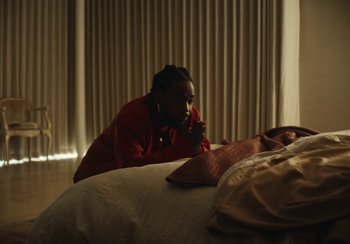 Movie still from “Kendrick Lamar - Rich Spirit” (2022), directed by Calmatic – Medium shot, Over the shoulder angle