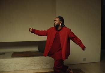 Movie still from “Kendrick Lamar - Rich Spirit” (2022), directed by Calmatic – Medium shot, Low angle