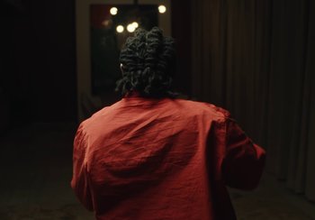 Movie still from “Kendrick Lamar - Rich Spirit” (2022), directed by Calmatic – Medium shot, Low angle