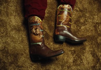 Movie still from “Kendrick Lamar - Rich Spirit” (2022), directed by Calmatic – Extreme Close Up shot, Overhead angle