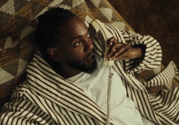 Movie still from “Kendrick Lamar - Rich Spirit” (2022), directed by Calmatic – Close Up shot, High angle