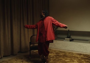 Movie still from “Kendrick Lamar - Rich Spirit” (2022), directed by Calmatic – Medium shot, Low angle