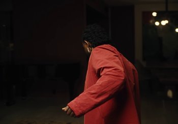 Movie still from “Kendrick Lamar - Rich Spirit” (2022), directed by Calmatic – Medium shot, Low angle