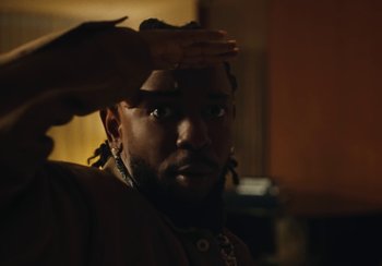 Movie still from “Kendrick Lamar - Rich Spirit” (2022), directed by Calmatic – Close Up shot, Low angle
