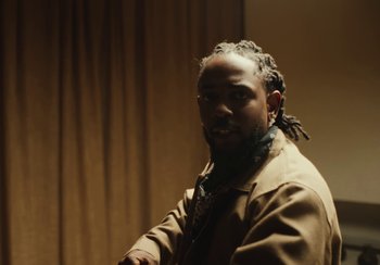 Movie still from “Kendrick Lamar - Rich Spirit” (2022), directed by Calmatic – Close Up shot, Low angle