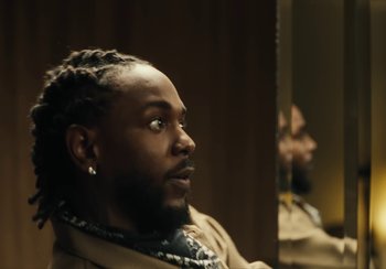 Movie still from “Kendrick Lamar - Rich Spirit” (2022), directed by Calmatic – Close Up shot, Over the shoulder angle