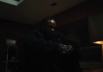 Movie still from “Kendrick Lamar - Rich Spirit” (2022), directed by Calmatic – Medium shot, High angle