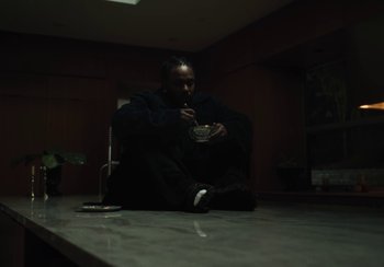 Movie still from “Kendrick Lamar - Rich Spirit” (2022), directed by Calmatic – Medium shot, High angle