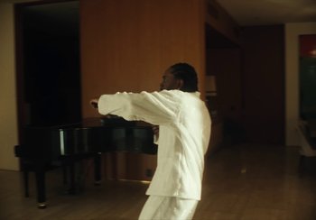 Movie still from “Kendrick Lamar - Rich Spirit” (2022), directed by Calmatic – Medium shot, Low angle