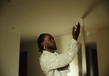 Movie still from “Kendrick Lamar - Rich Spirit” (2022), directed by Calmatic – Close Up shot, Low angle