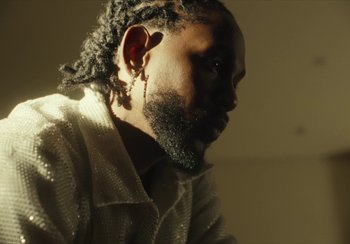 Movie still from “Kendrick Lamar - Rich Spirit” (2022), directed by Calmatic – Close Up shot, Low angle