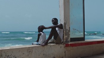 Movie still from “The Blaze - Dreamer” (2022), directed by The Blaze – Medium shot, Over the shoulder angle