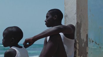 Movie still from “The Blaze - Dreamer” (2022), directed by The Blaze – Medium shot, Low angle