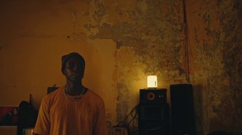 Movie still from “The Blaze - Dreamer” (2022), directed by The Blaze – Medium shot, Low angle