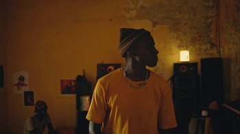 Movie still from “The Blaze - Dreamer” (2022), directed by The Blaze – Medium shot, Low angle