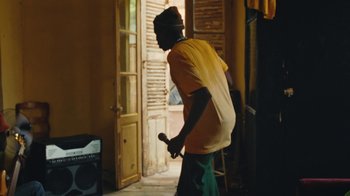 Movie still from “The Blaze - Dreamer” (2022), directed by The Blaze – Medium shot, Low angle