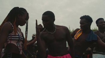 Movie still from “The Blaze - Dreamer” (2022), directed by The Blaze – Medium shot, Low angle
