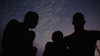 Movie still from “The Blaze - Dreamer” (2022), directed by The Blaze – Medium shot, Low angle