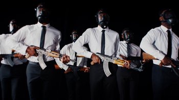 Movie still from “Tshegue - Mais” (2022), directed by Ibrahim Kamara – Wide shot, Low angle