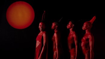 Movie still from “Tshegue - Mais” (2022), directed by Ibrahim Kamara – Wide shot, Low angle