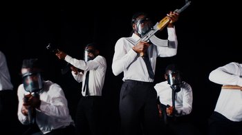 Movie still from “Tshegue - Mais” (2022), directed by Ibrahim Kamara – Medium shot, Low angle