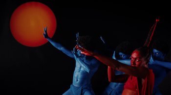 Movie still from “Tshegue - Mais” (2022), directed by Ibrahim Kamara – Medium shot, Low angle