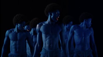Movie still from “Tshegue - Mais” (2022), directed by Ibrahim Kamara – Medium shot, Low angle