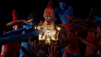 Movie still from “Tshegue - Mais” (2022), directed by Ibrahim Kamara – Medium shot, Low angle