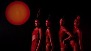 Movie still from “Tshegue - Mais” (2022), directed by Ibrahim Kamara – Wide shot, Low angle
