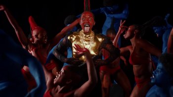 Movie still from “Tshegue - Mais” (2022), directed by Ibrahim Kamara – Medium shot, Low angle