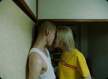 Movie still from “ZNTNDR - Untitled Us” (2022), directed by Jovan Todorović – Medium shot, Low angle