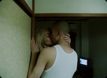Movie still from “ZNTNDR - Untitled Us” (2022), directed by Jovan Todorović – Medium shot, Low angle
