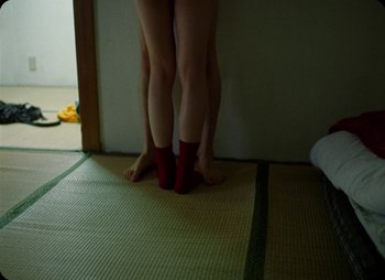 Movie still from “ZNTNDR - Untitled Us” (2022), directed by Jovan Todorović – Extreme Close Up shot, Low angle