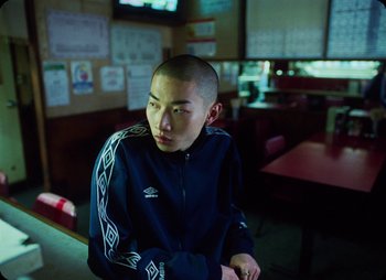 Movie still from “ZNTNDR - Untitled Us” (2022), directed by Jovan Todorović – Close Up shot, Low angle