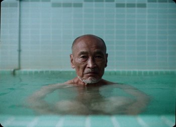 Movie still from “ZNTNDR - Untitled Us” (2022), directed by Jovan Todorović – Close Up shot, High angle