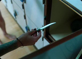 Movie still from “ZNTNDR - Untitled Us” (2022), directed by Jovan Todorović – Extreme Close Up shot, High angle