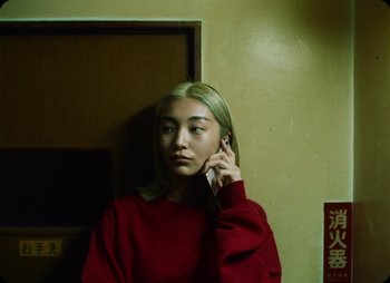 Movie still from “ZNTNDR - Untitled Us” (2022), directed by Jovan Todorović – Close Up shot, Low angle