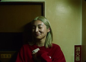 Movie still from “ZNTNDR - Untitled Us” (2022), directed by Jovan Todorović – Close Up shot, High angle