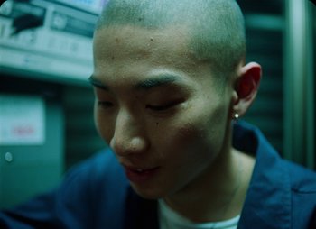 Movie still from “ZNTNDR - Untitled Us” (2022), directed by Jovan Todorović – Close Up shot, High angle