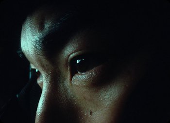 Movie still from “ZNTNDR - Untitled Us” (2022), directed by Jovan Todorović – Extreme Close Up shot, Low angle